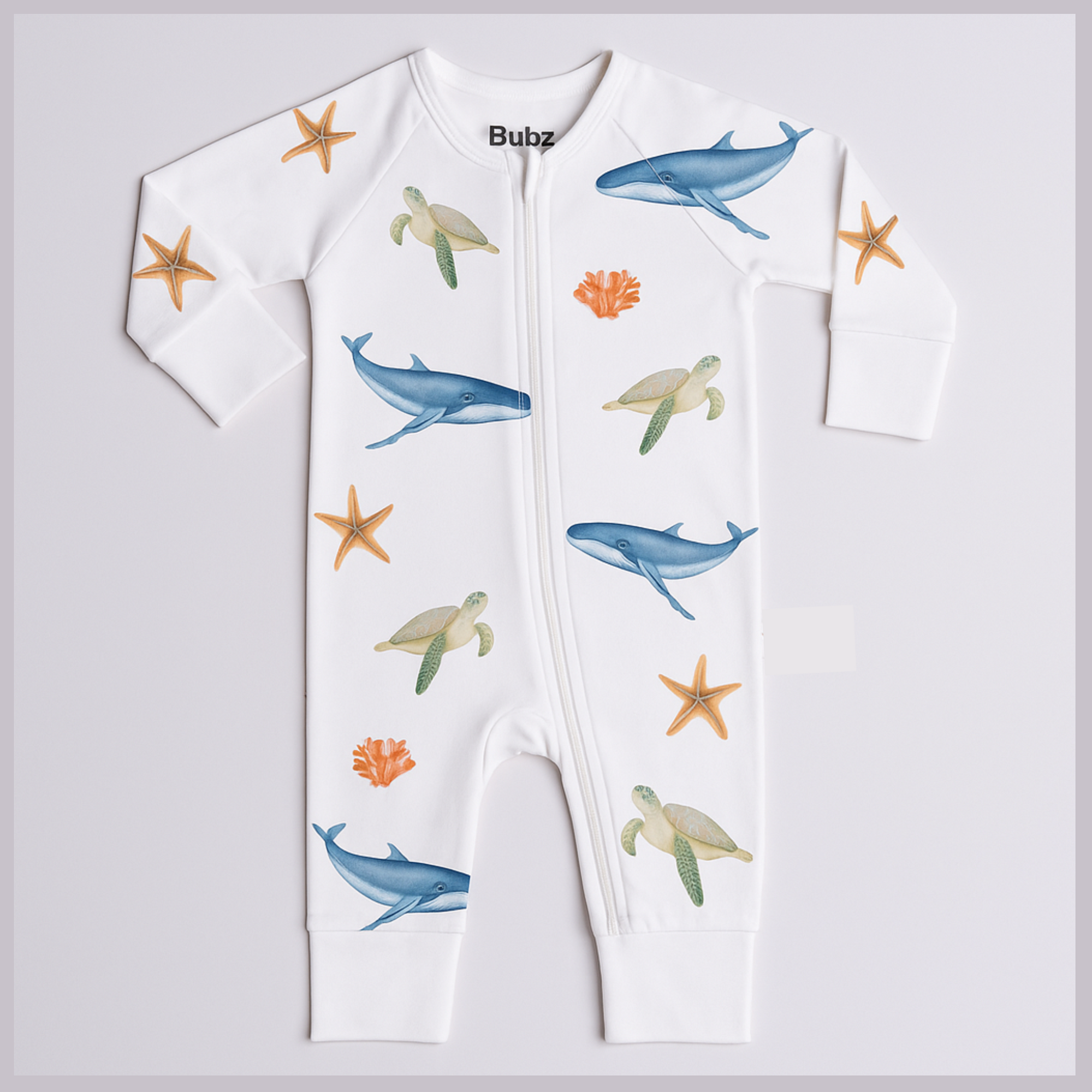 Baby onesie with under the sea patterns on a white background